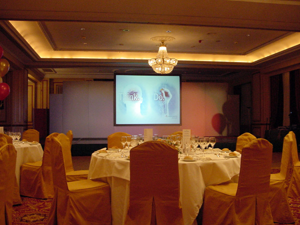 Gala dinner room and projection setup for a Novartis event at The Palace Hotel Madrid